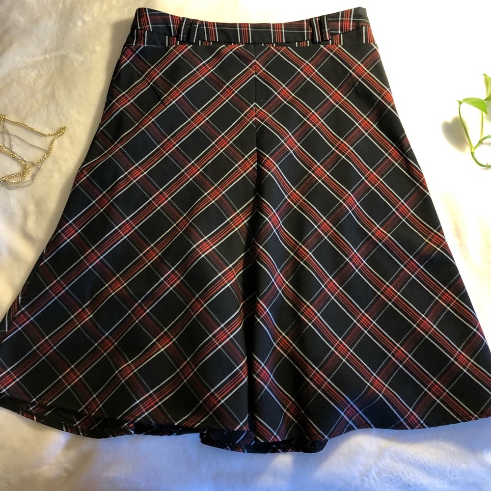 Longish plaid skirt with belt loops and side zip